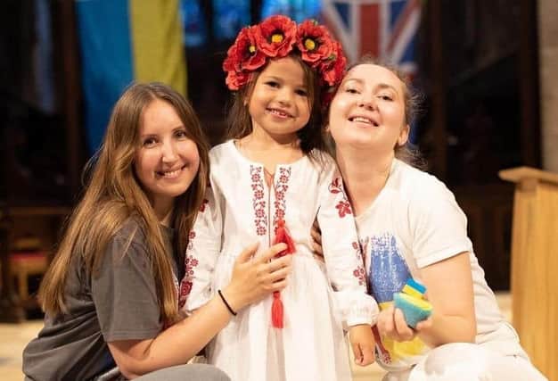 Some of the Ukrainian people who have fled the war pictured at a Melton church service this summer to mark the nation's independence