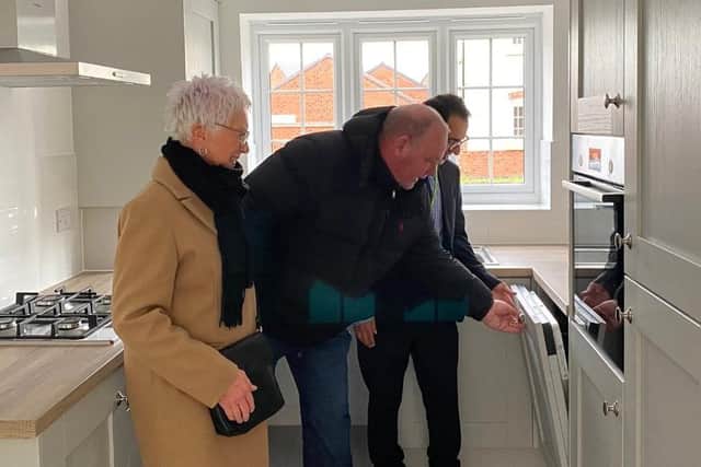 Asfordby ward councillors check out the kitchen at one of Melton Council's new houses in the village