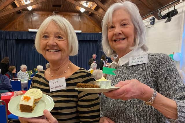 President Jeanne Tetstall (right) and vice-president Kay Drake at today's centenary party for Wymondham WI