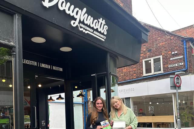 Megan from Nexus Fostering and Heidi from Doughnotts outside the Beeston branch.