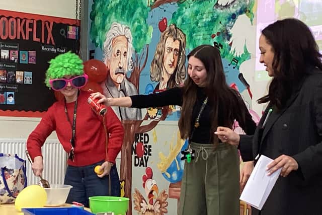Buckminster Primary School staff perform a Bake-Off demo on Comic Relief day