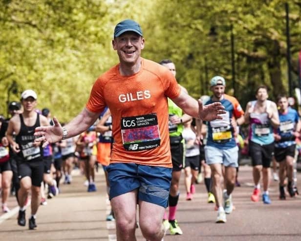 Giles Ashton-Roberts pictured running one of his marathons