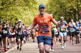 Giles Ashton-Roberts pictured running one of his marathons
