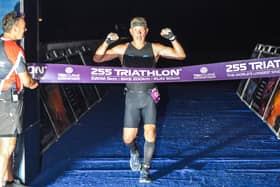 Mark Bone crosses the finish line in Chichester.