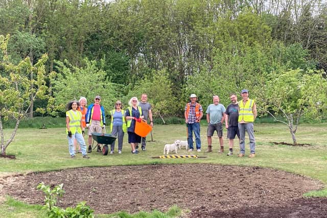 FOMCP volunteers installing the VE Day commemorative wildflower bed