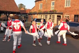 Members of New Saint George Morris performing