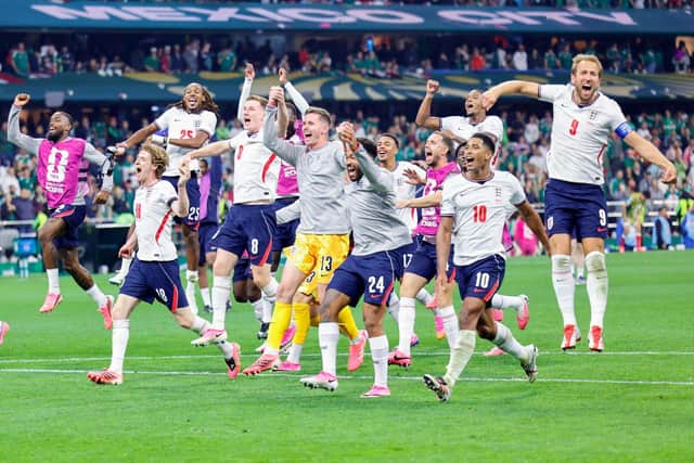 England players celebrate after sealing a 3-2 World Cup win over Mexico PHOTO Getty Images (Photo by Rodrigo Oropeza / AFP via Getty Images)