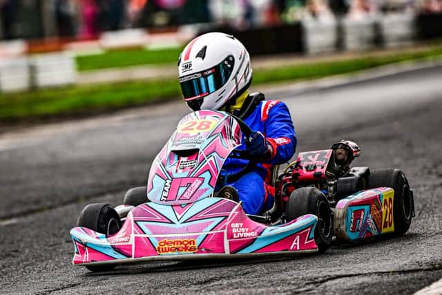 Aiden Ingram racing karts on the track