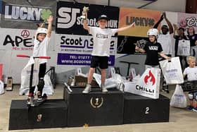 Bruno Battams celebrates winning the age 6 and under category at the ISF (International Scooter Federation) Youth World Championships at Corby