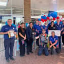 Chris McDowell visits staff at the Melton Mowbray Tesco store during his 500-mile charity challenge