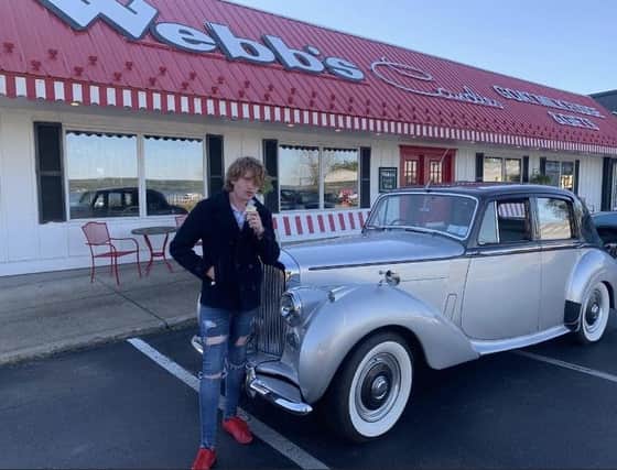 Comac Boylan stops off for ice cream while driving an old Bentley on his American trip