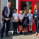 MP for Melton and Syston, Mr Ed Argar and Executive Head Teacher, Hannah Roddy, with pupils