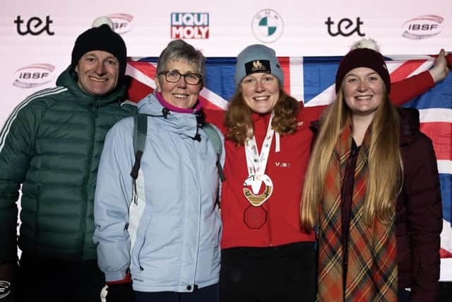 Amelia Coltman with parents Gary and Theresa and her sister Charlotte