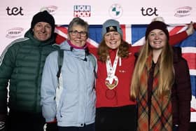 Amelia Coltman with parents Gary and Theresa and her sister Charlotte