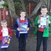 The Waltham School pupils who were chosen as winner, first and second in the church Christmas card competition
