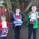 The Waltham School pupils who were chosen as winner, first and second in the church Christmas card competition