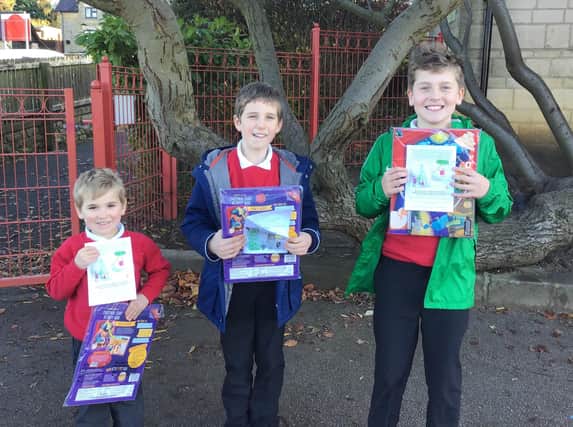 The Waltham School pupils who were chosen as winner, first and second in the church Christmas card competition
