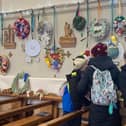 Visitors enjoying a tour of last year's annual Melton Christmas wreaths festival at St John's Catholic Church