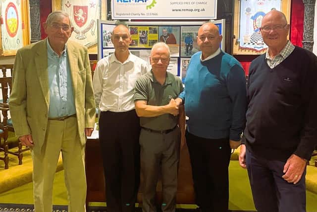 Past master of St Mary’s Lodge, Vince Howard, presents a £500 cheque to Martin Grant, on behalf of the Leicestershire and Rutland branch of REMAP, with, from left, Lodge members William Hutchison, Ian Perry and David Alcraft