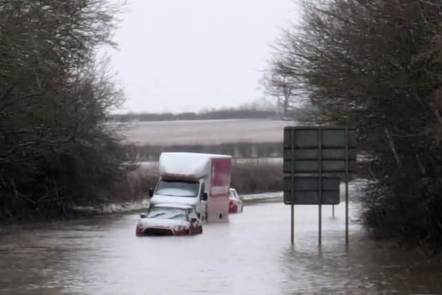 Cars stuck in floods on the A6006 near Melton on Monday IMAGE Stacey Prentice