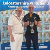 Bill Sampson receiving Masters Swimmer of the Year award