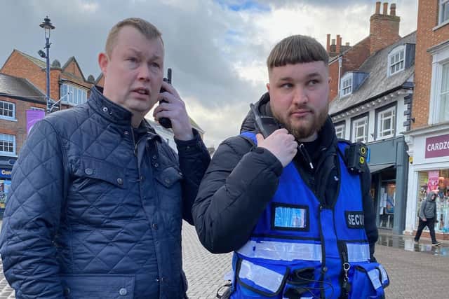 Trader Barrie Roberts (left) and security operative Nick test out the radio system which is working so well in Melton Mowbray