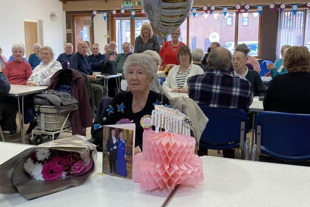 Kathleen Bishop celebrates her 100th birthday with friends at the Evergeen Club at Melton's Age UK Gloucester House