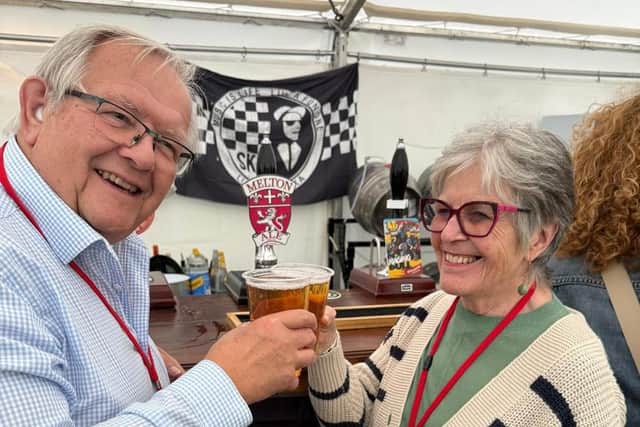Senior Townwarden, Adrienne Holland, and Town Estate chair of feoffees, Graham Bett, toast the success of SKA Fest Images provided by Louise Leech Photography