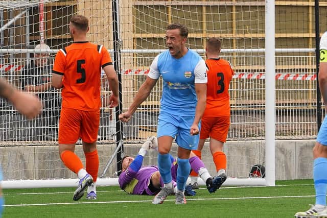 Mason Lee celebrates scoring the equaliser for Melton on Saturday. Photo: Mark Woolterton.
