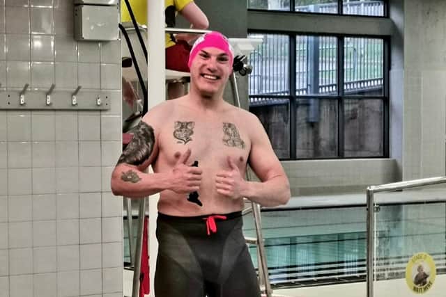 Mark Faulkner pictured at the end of his epic fundraising swim at Waterfield Leisure Centre in Melton