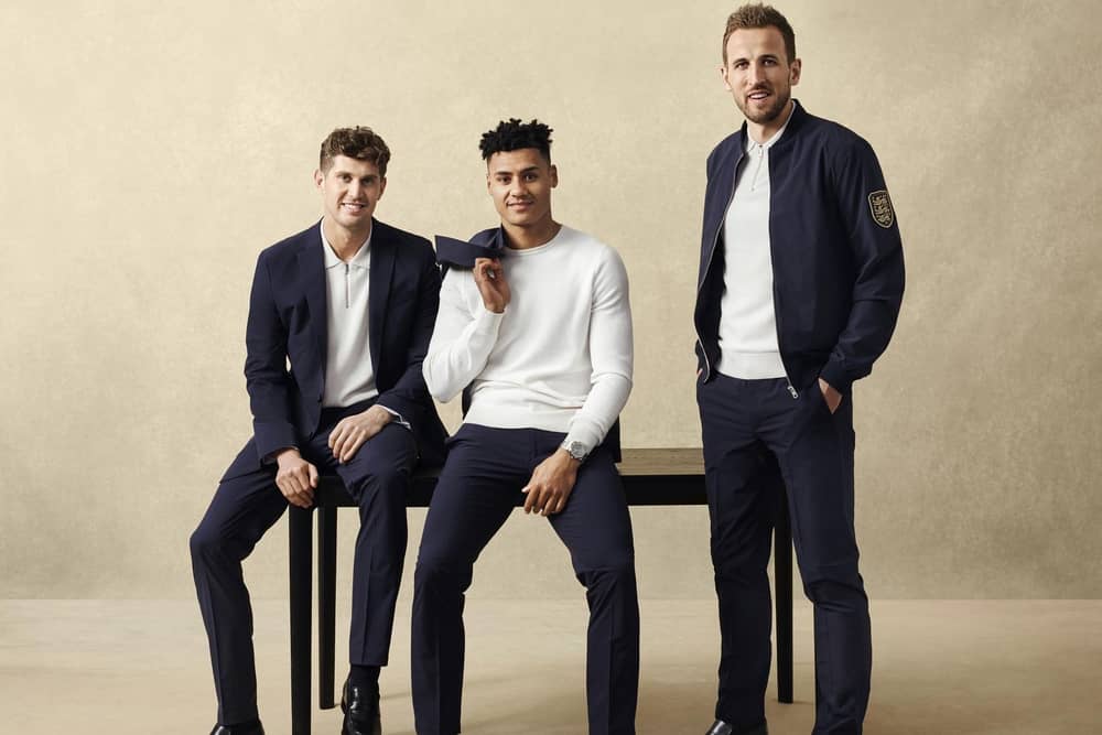 John Stones wears: The Performance Suit Jacket, The Performance Zip Polo, The Performance Trouser & The Loafer
Ollie Watkins wears: The Performance Crew, The Performance Trouser & The Loafer
Harry Kane wears: The Performance Bomber, The Performance Zip Polo, The Performance Trouser & The Loafer