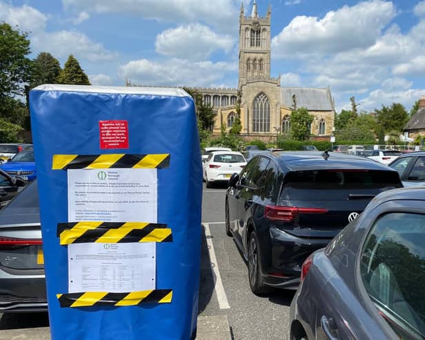 One of the covered up parking machines in the Melton Borough Council car park off Burton Street