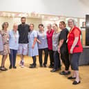 Kasabian singer Serge Pizzorno with nurses and volunteers at LOROS Hospice ahead of this month's Stomp Round Leicester art trail fundraiser