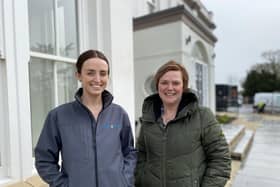 Jenny Moore (right), of Moores Estate Agents, and Emily Smith, of Grace Homes, outside the western facade of the converted Sysonby Lodge building in Melton Mowbray