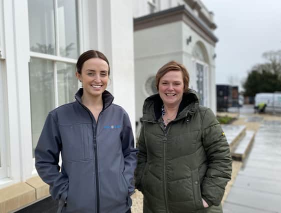 Jenny Moore (right), of Moores Estate Agents, and Emily Smith, of Grace Homes, outside the western facade of the converted Sysonby Lodge building in Melton Mowbray