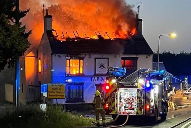 The devastating blaze which destroyed the Tap & Run in June last year