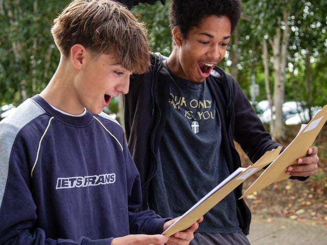 Students sharing their GCSE results.