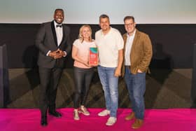 Gareth and Jo, of Woodcote Event, pictured being presented with their award by Professor Dylan Jones-Evans OBE, and Awards Host Calvin Eden