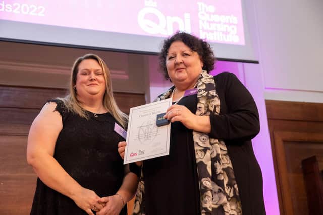 Donna Fraser (left) receivers her Queen’s Nurse certificate from Deborah Sturdy, the chief nurse for adult social care.
Photo by Kate Stanworth