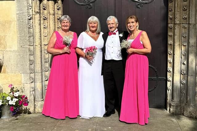 William and Elizbeth Peters renew their vows with bridesmaids from their 1973 wedding, Denise and Debbie