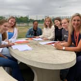 Head of school, Natalie Teece, with students on GCSE results day at John Ferneley College