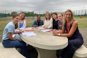 Head of school, Natalie Teece, with students on GCSE results day at John Ferneley College