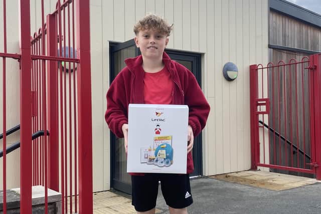 Bruno Battams with one of the life-saving devices his fundraising helped pay for