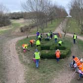 Frends of Melton Country Park volunteers preparing the Royal Bed for wild flower seed sowing