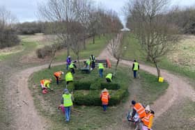 Frends of Melton Country Park volunteers preparing the Royal Bed for wild flower seed sowing