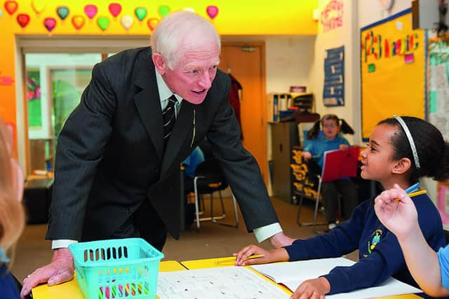 Business leader Sir David Samworth on a visit to one of the academies supported by Samworth Brothers