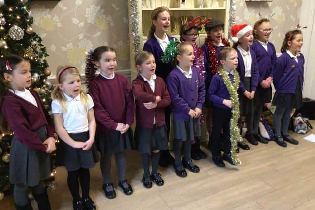 Somerby pupils sing carols at Framland Residential Home in Melton