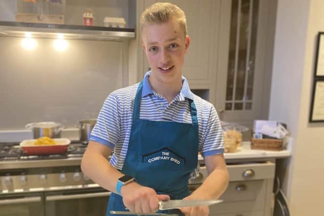 Alf cooking at home.
