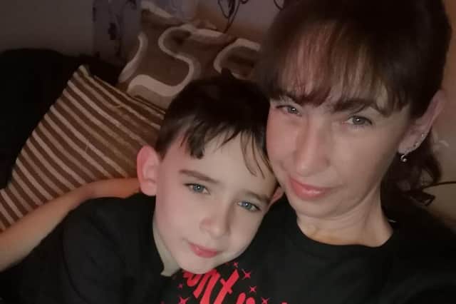 Lucas Posey-Bottomley, who passed away in December aged 10, with his mum, Kim