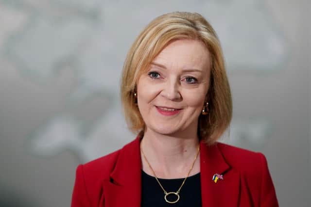 LEEDS, ENGLAND - JULY 28: British Foreign Secretary Liz Truss fields questions from the media during a campaign visit to a broadband interchange company on July 28, 2022 in Leeds, England. Liz Truss and Rishi Sunak are attending the first Leadership Campaign hustings for Conservative Party members in Leeds this evening. (Photo by Ian Forsyth/Getty Images)